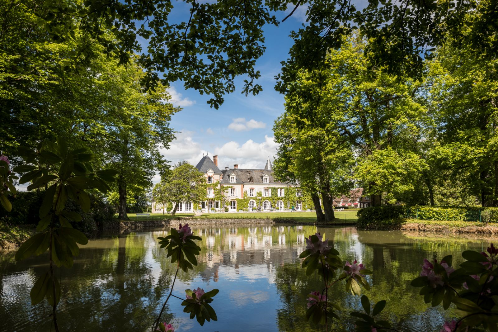 Exterior and lake view of Les Hauts de Loire in the Loire Valley, France