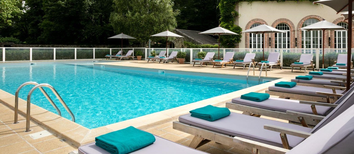Poolside and sunbeds at Les Hauts de Loire in the Loire Valley, France