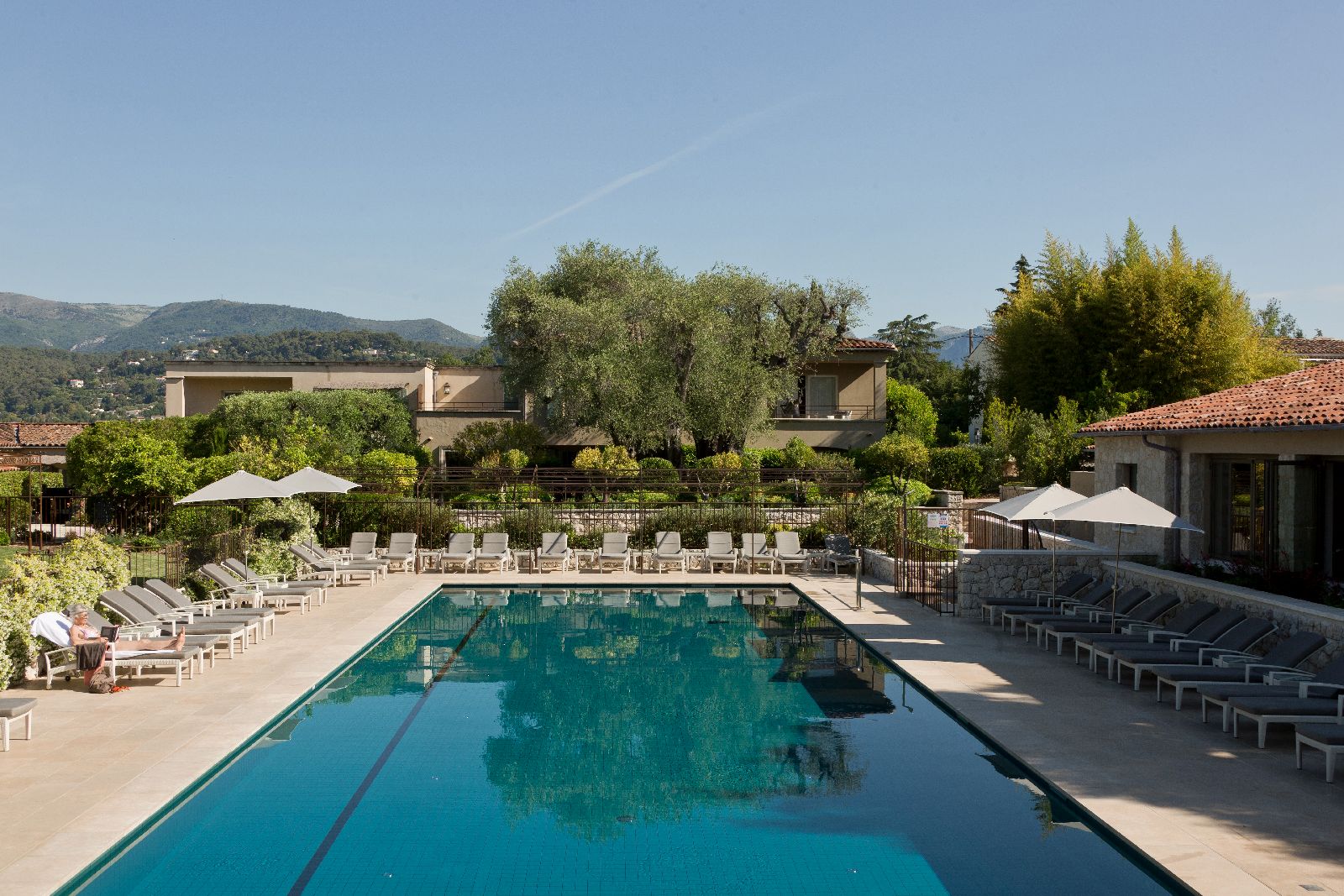 Swimming pool and terrace at Domaine du Mas de Pierre in Provence France