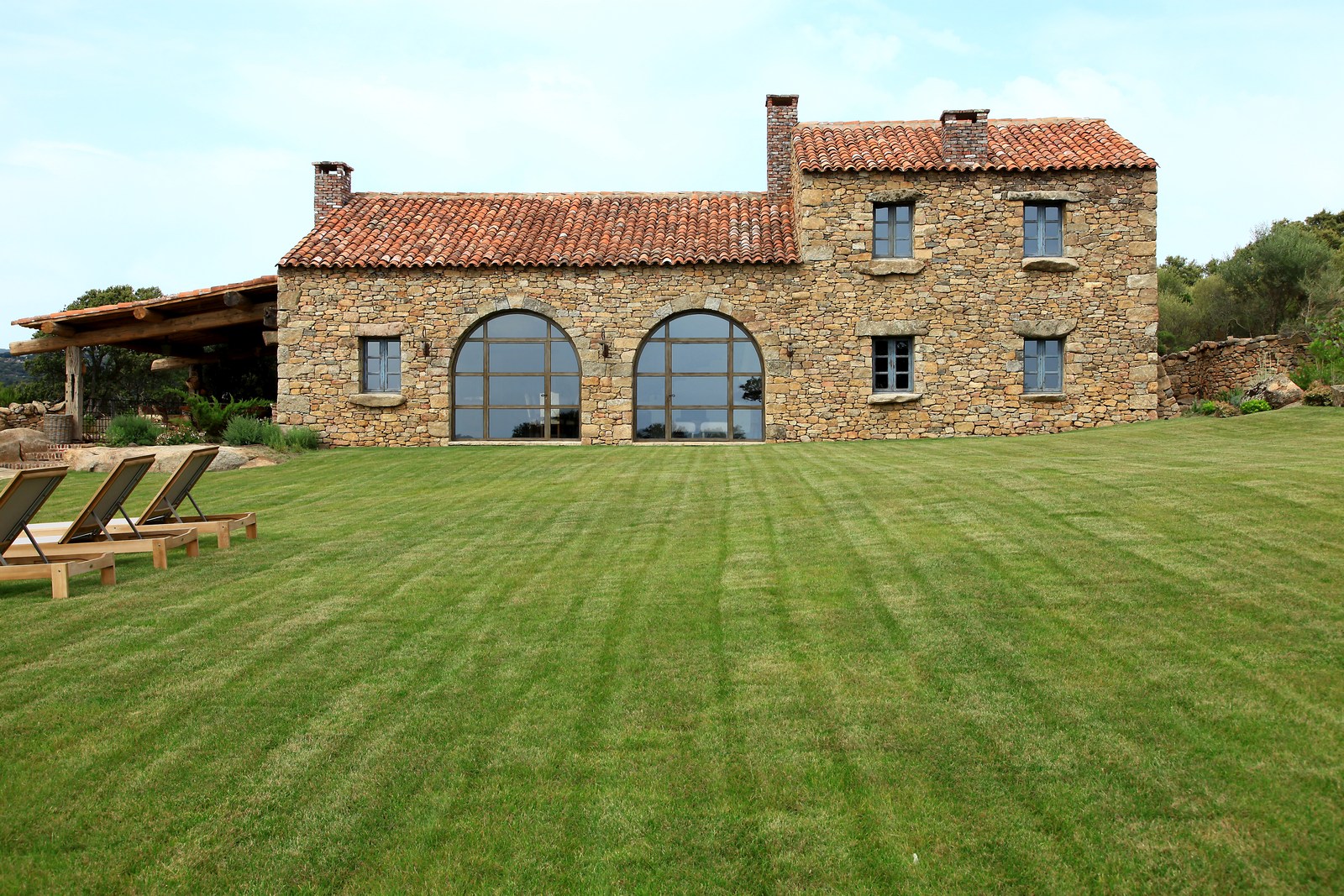 Garden and facade of U Fragnu, Corsica