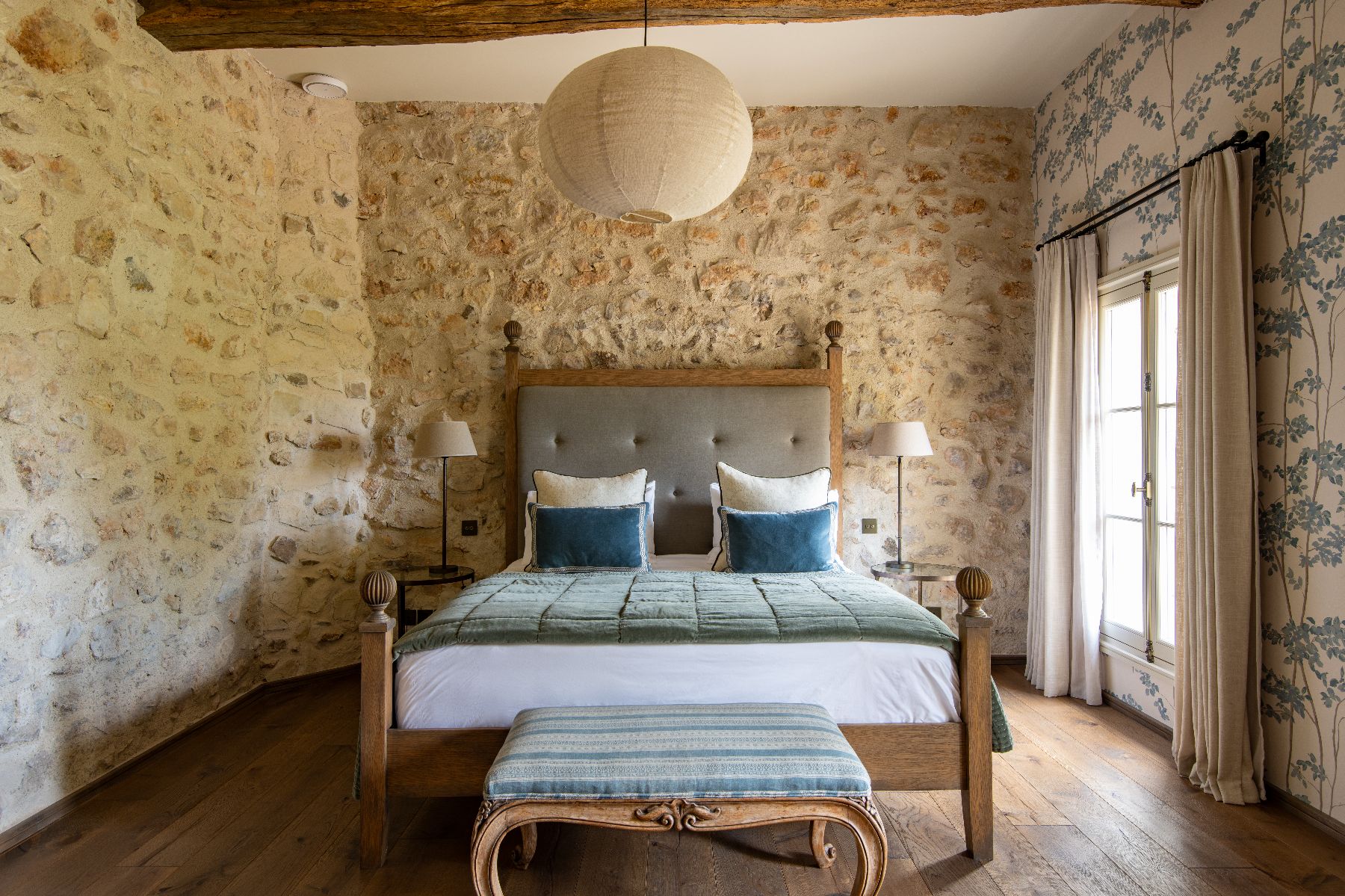 Queen bed in master bedroom at Bastide Notre Dame in Cote d'Azur, France