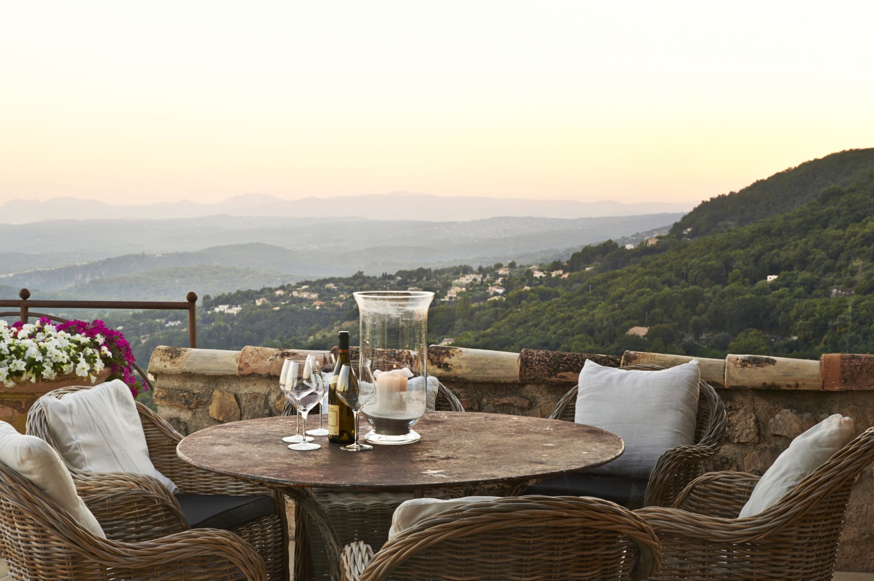 Table and four chairs on the terrace at Villa Les Hauts de Vence in the Cote dAzur