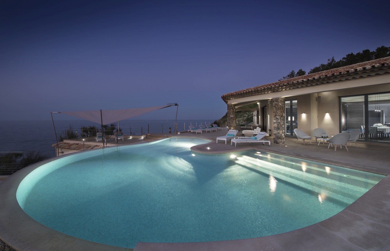 Swimming pool by night at Villa des Voiles, Cote d'Azur