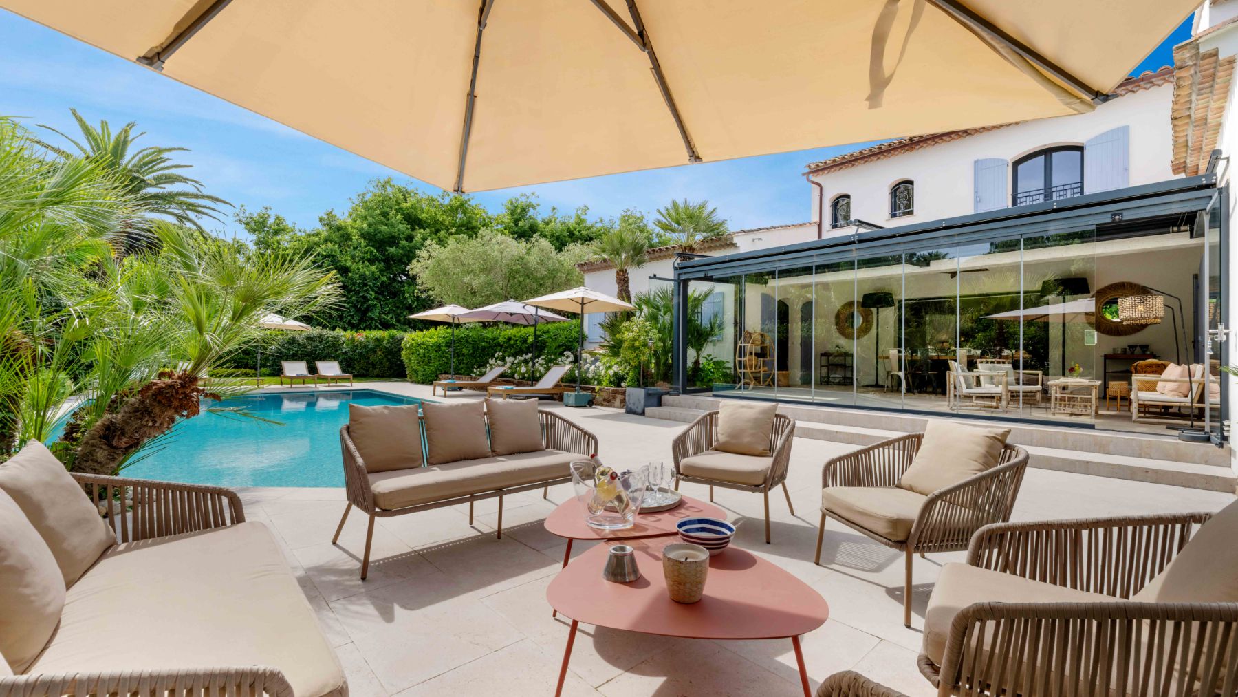 Outdoor seating at Villa Les Palmiers in Cote D'Azur