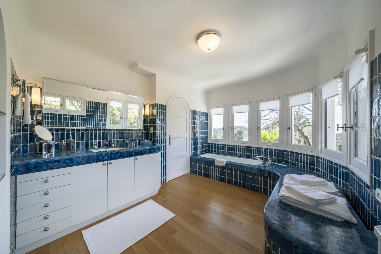 Blue and white bathroom of the master bedroom at luxury villa Malvan