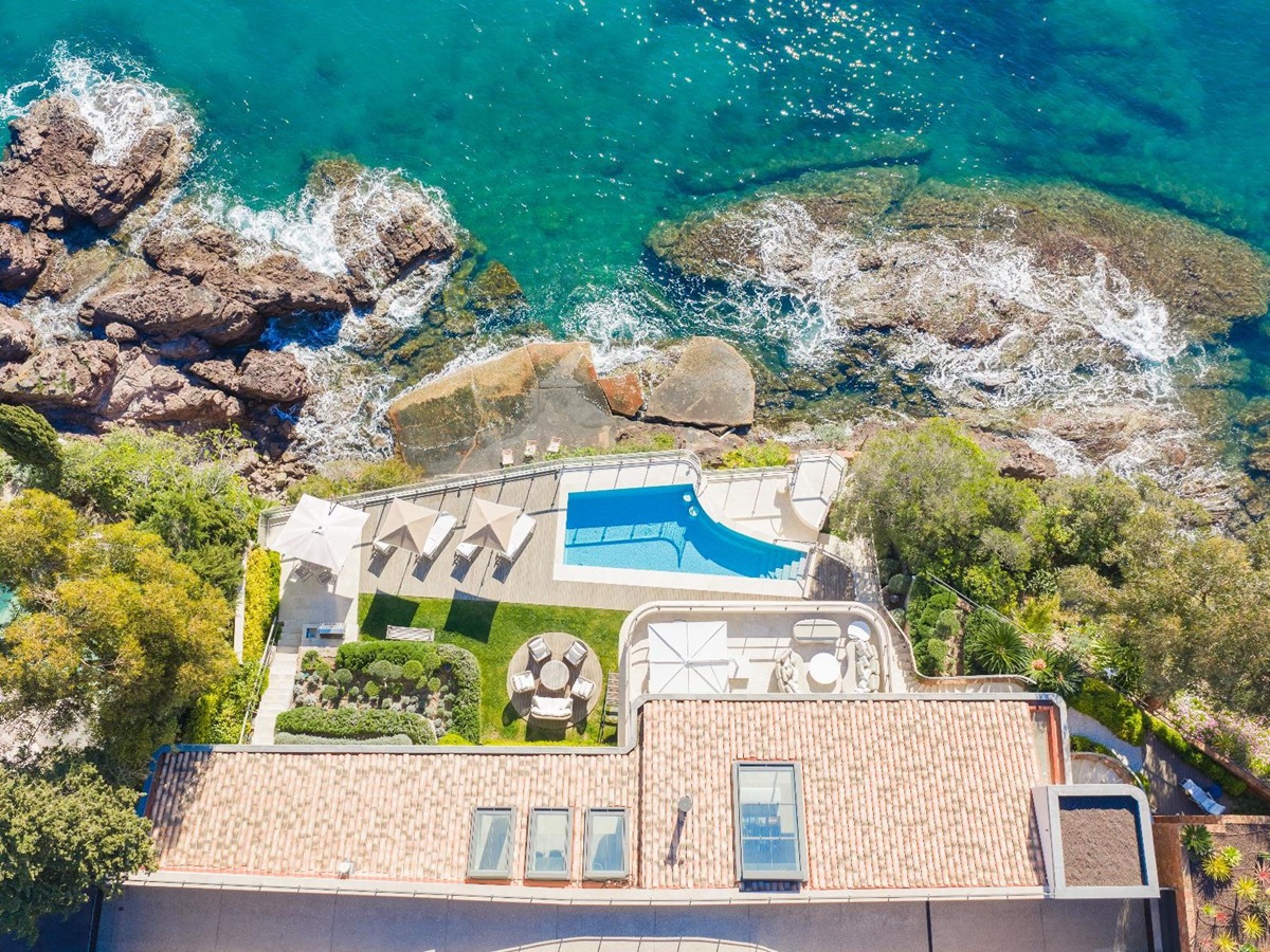Aerial view of the pool and the private beach at Villa Mathilde in Cote d'Azur