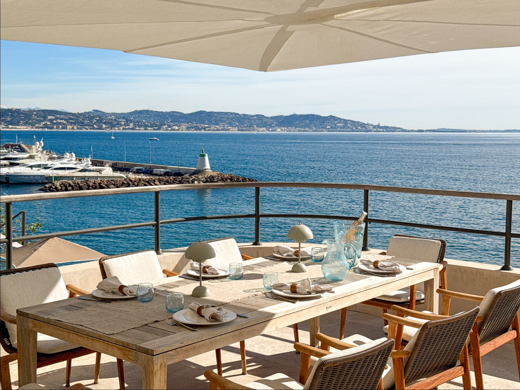 Outdoor dining table over looking the sea at Villa Mathilde in Cote d'Azur