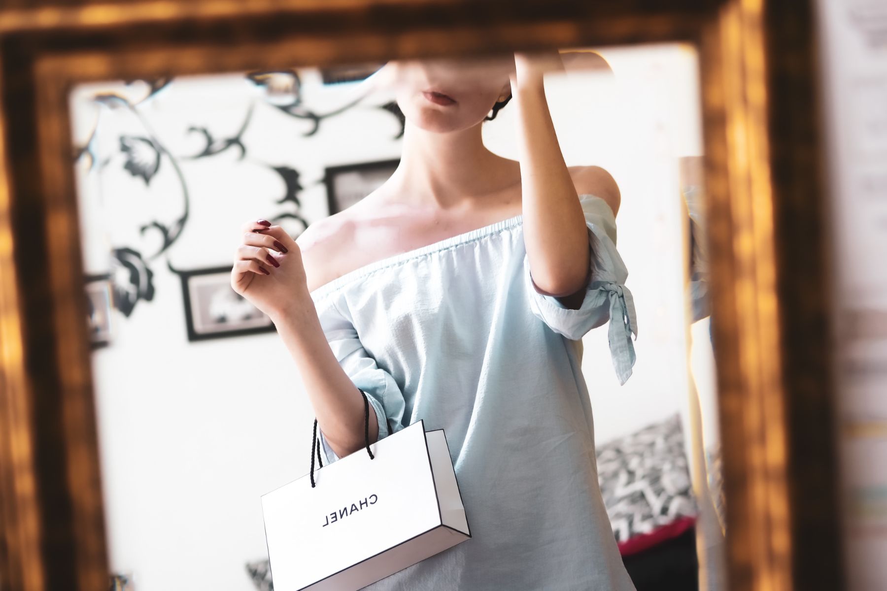 A woman with a Chanel bag