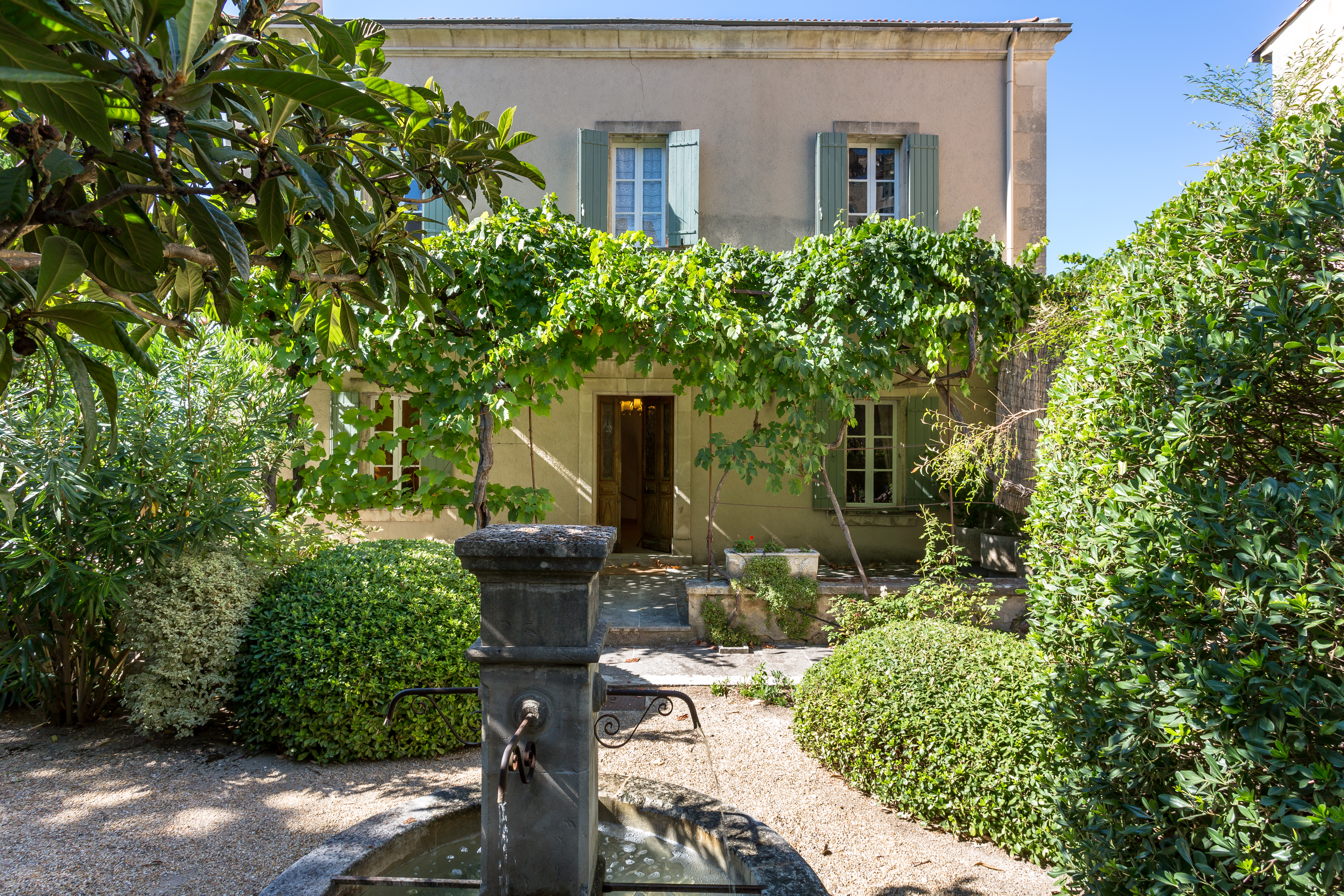 Front of property with fountain at Bastide de Aristide