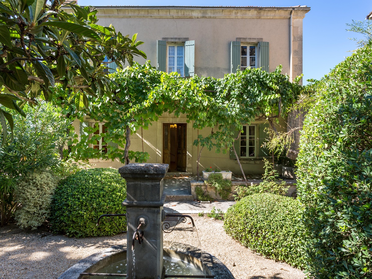 Front of property with fountain at Bastide de Aristide