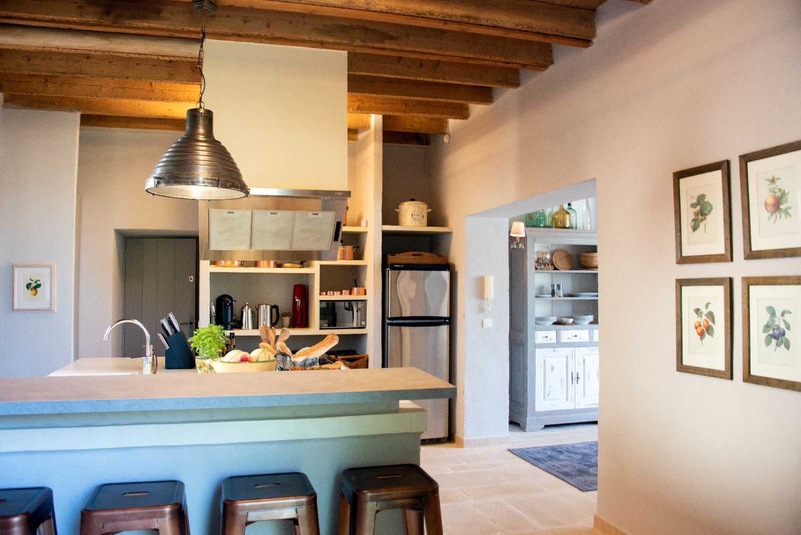 Kitchen with bar seating at Bastide d'Aristide in Provence