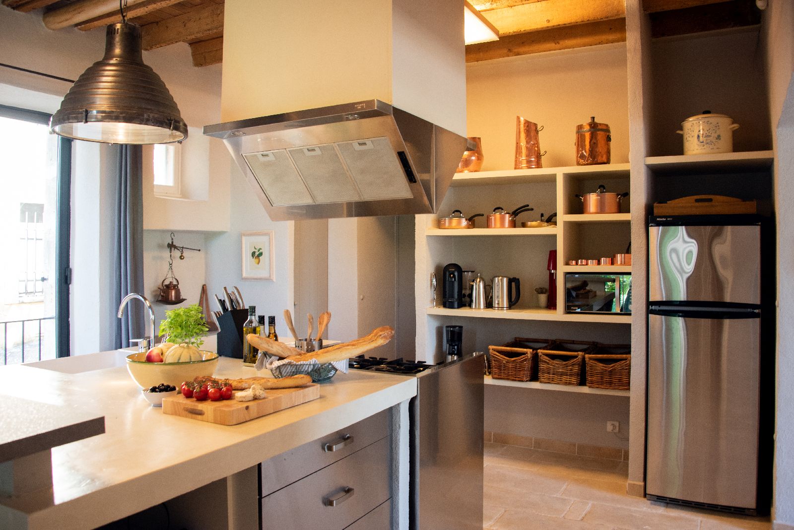Kitchen with island at Bastide d'Aristide in Provence