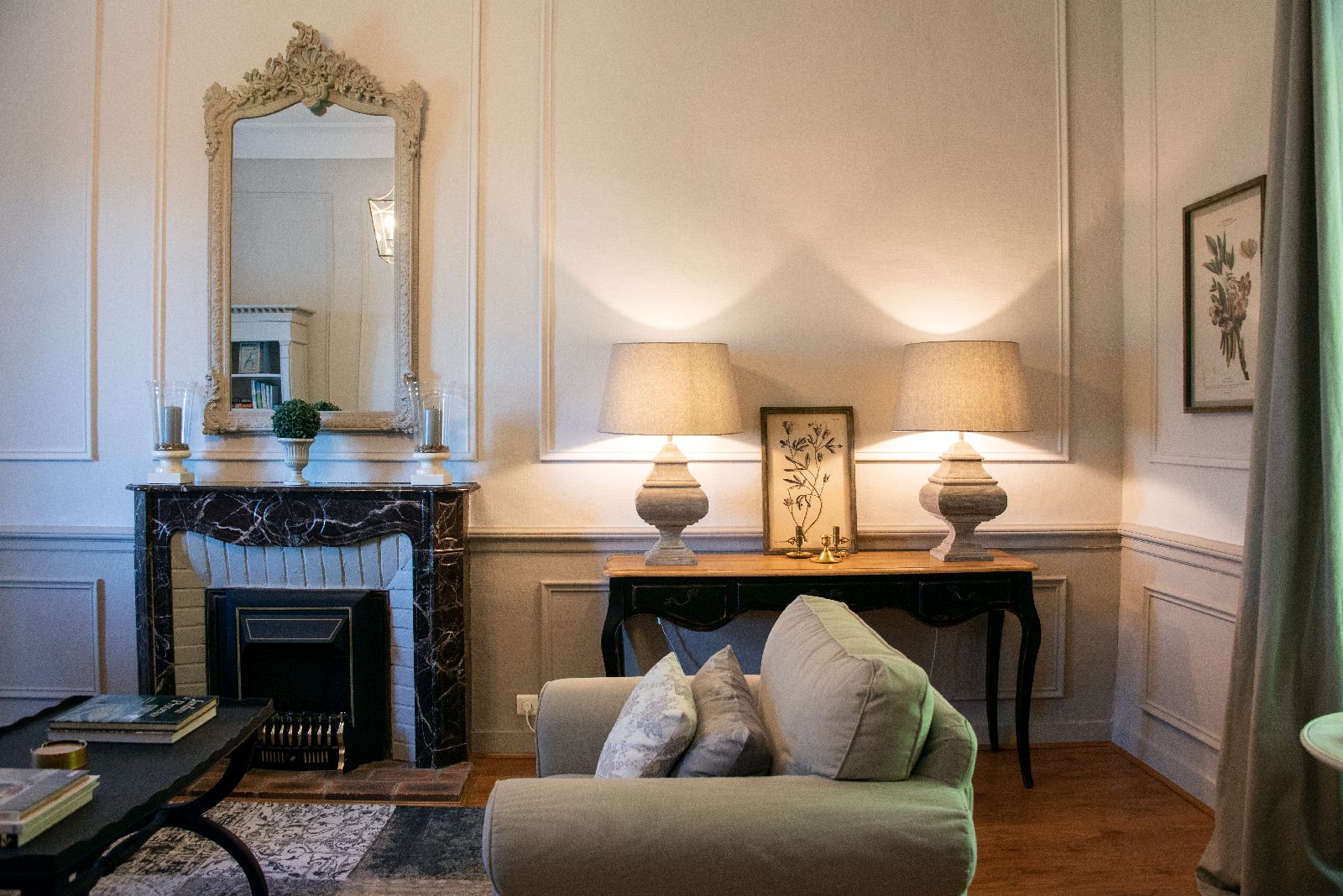 Sitting room with comfy green chair at Bastide d'Aristide in Provence