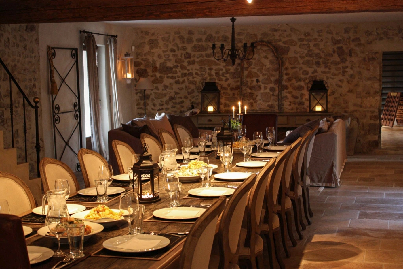 Large dining table in the evening at Bastide Sur La Sorgue in Provence