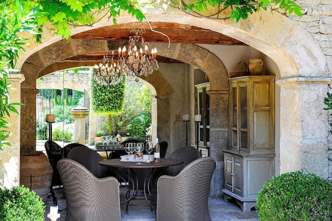 Outdoor seating with chairs and chandelier Bastide sur la Sorgue in Provence