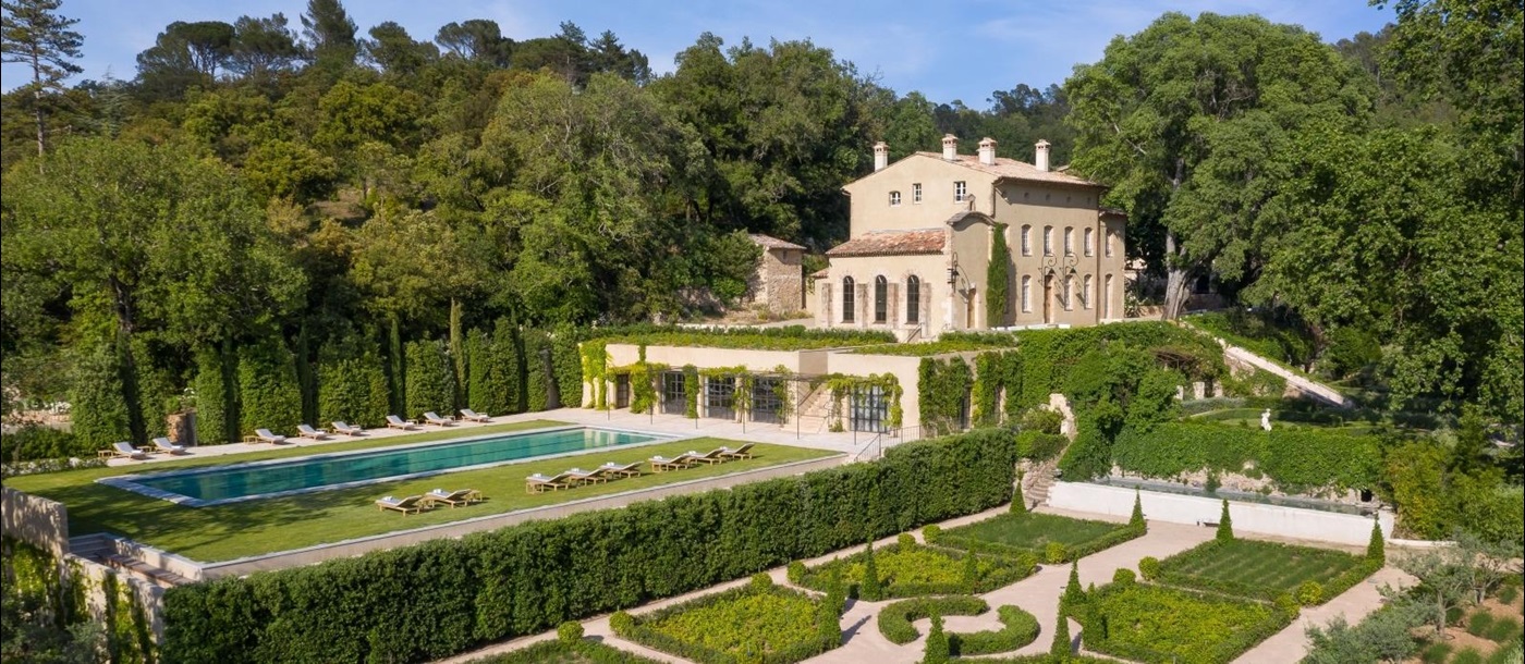 Aerial view of villa, gardens and pool at Chateau Margui in Provence, France