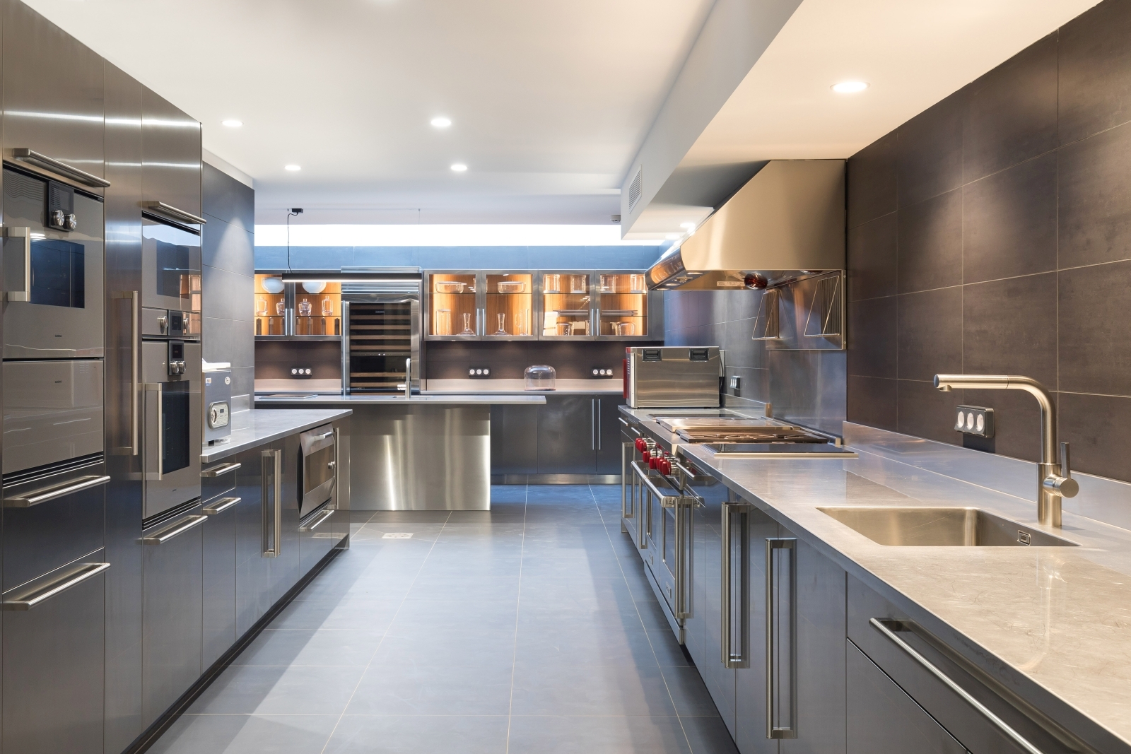 Kitchen with cabinets and appliances at Chateau Margui in Provence, France