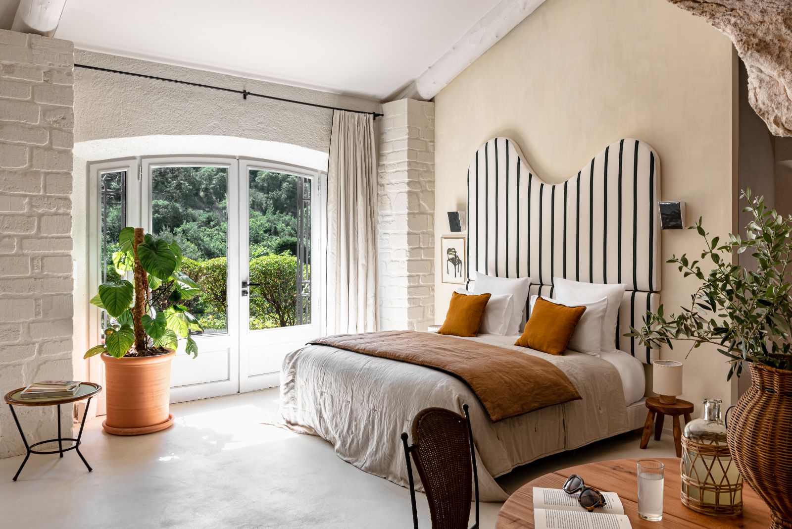 bedroom with striped headboard