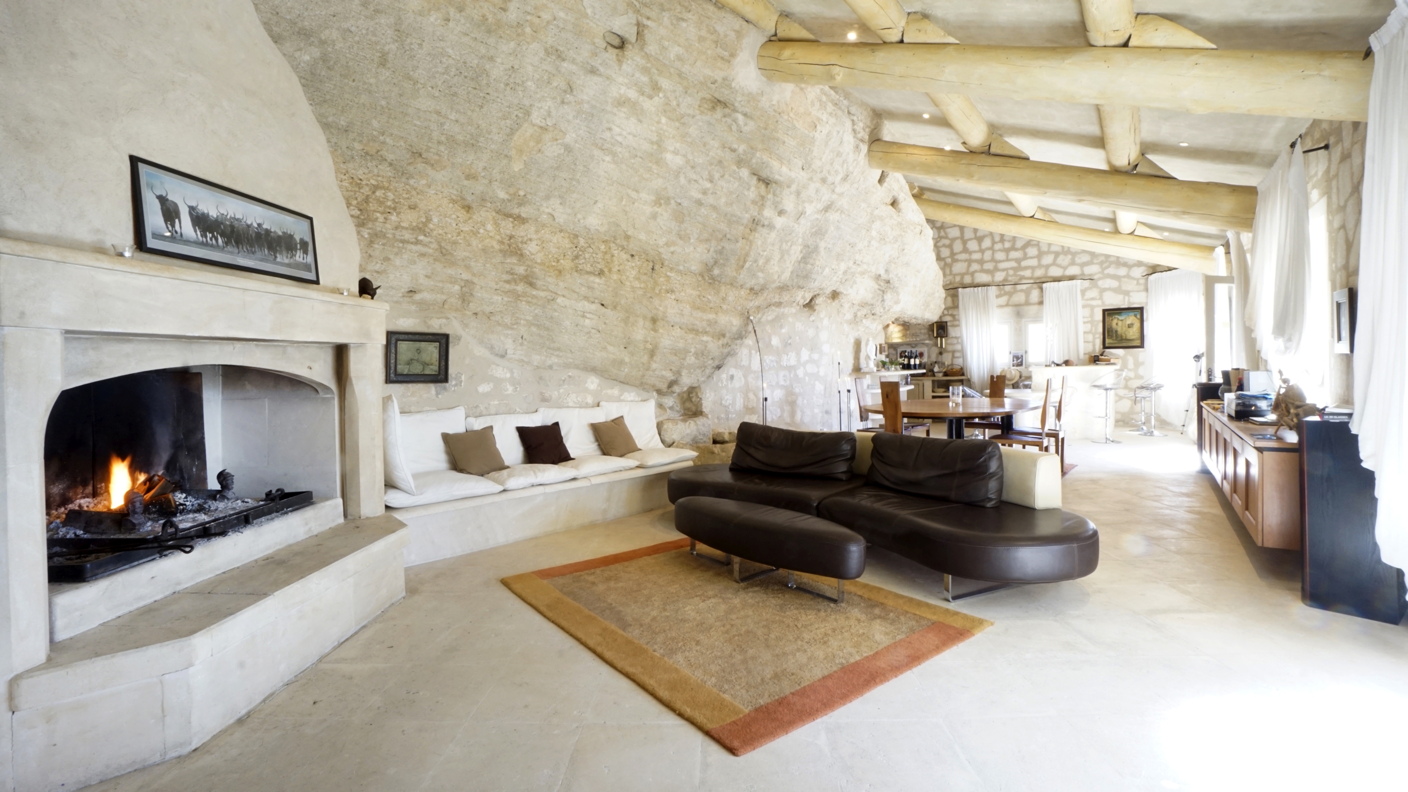 living room with fireplace in Les Rochers, Provence