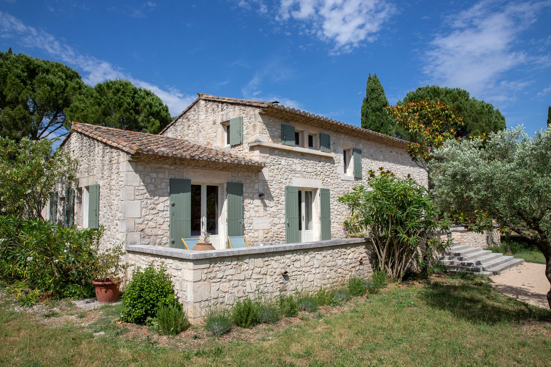Exterior at Maison Les Baux in Provence, with terrrace in the foreground