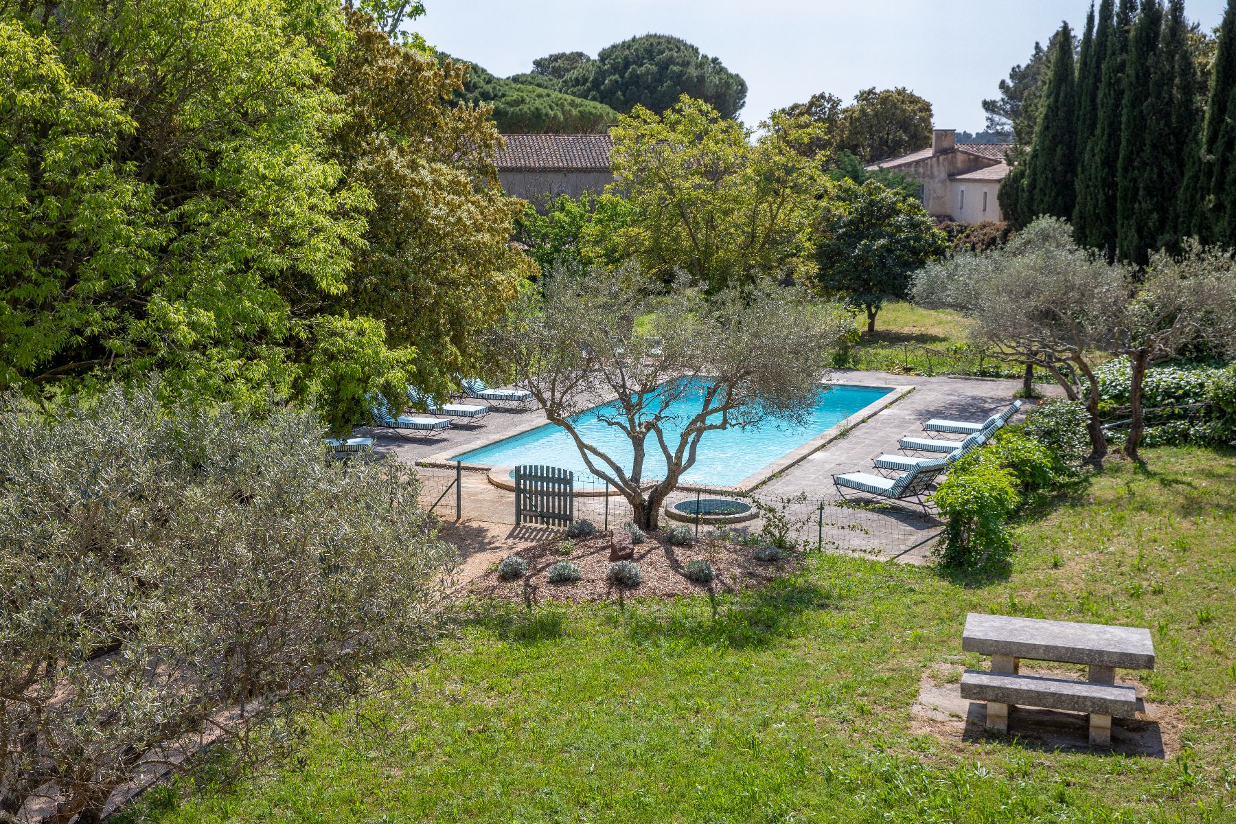 Pool and gardens at private villa Maison Les Baux, near Les Baux de Provence, France