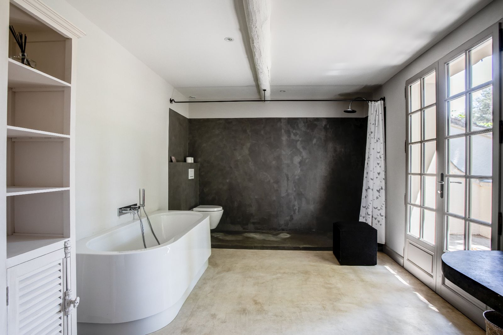 Bathroom with large tub at Mas Calanquet in Provence