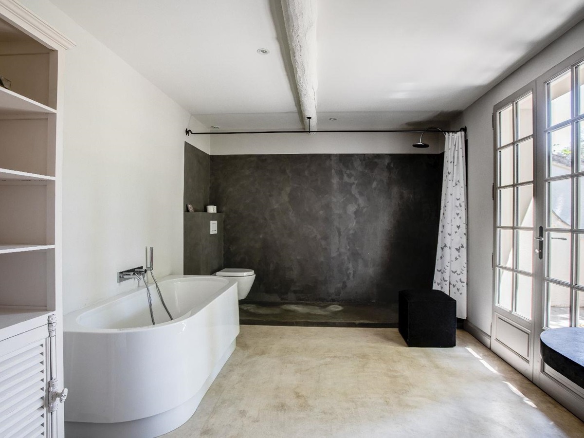 Bathroom with large tub at Mas Calanquet in Provence