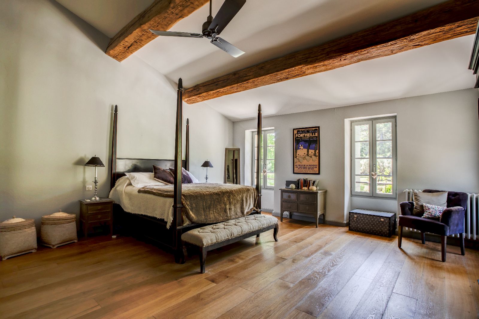 Double bedroom with four poster bed at Mas Calanquet in Provence