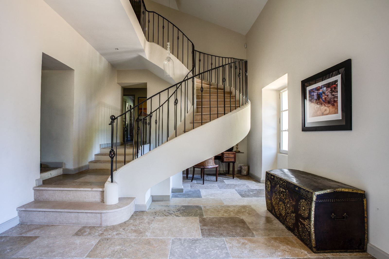 Hallway with winding staircase at Mas Calanquet in Provence