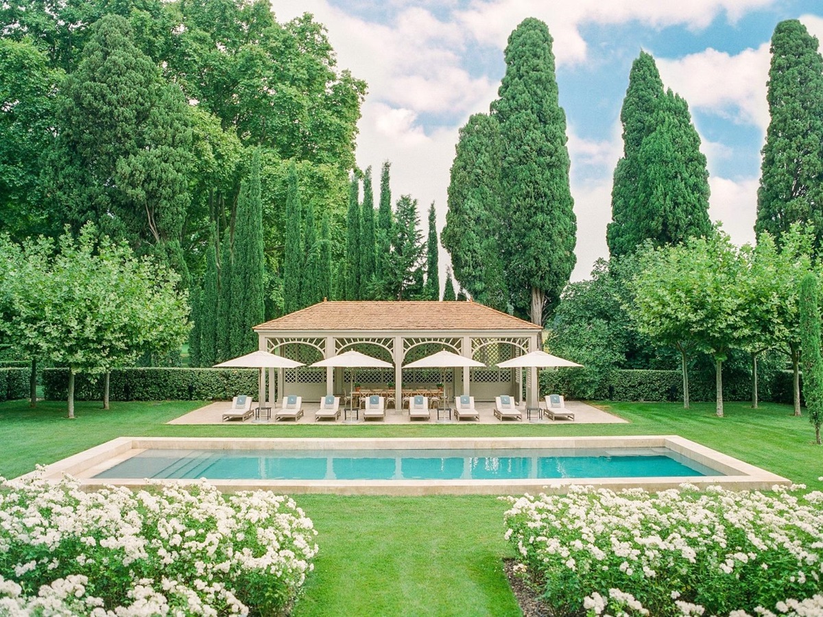 Pool house from front angle with loungers at Mas de la Motte in Provence