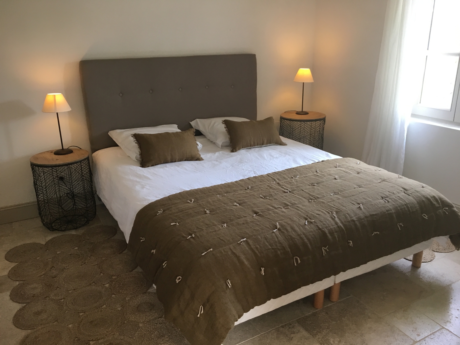 Double bedroom with grey furnishings at Mas Eygalieres in Provence