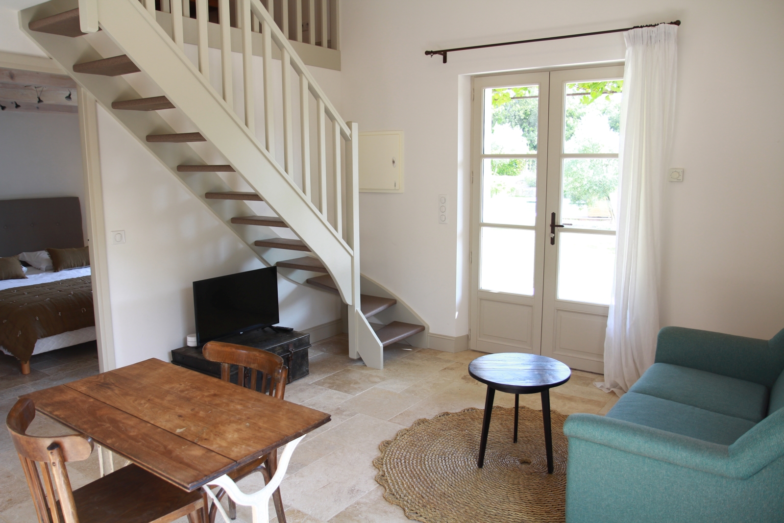 Guest house living room with french doors at Mas Eygalieres in Provence
