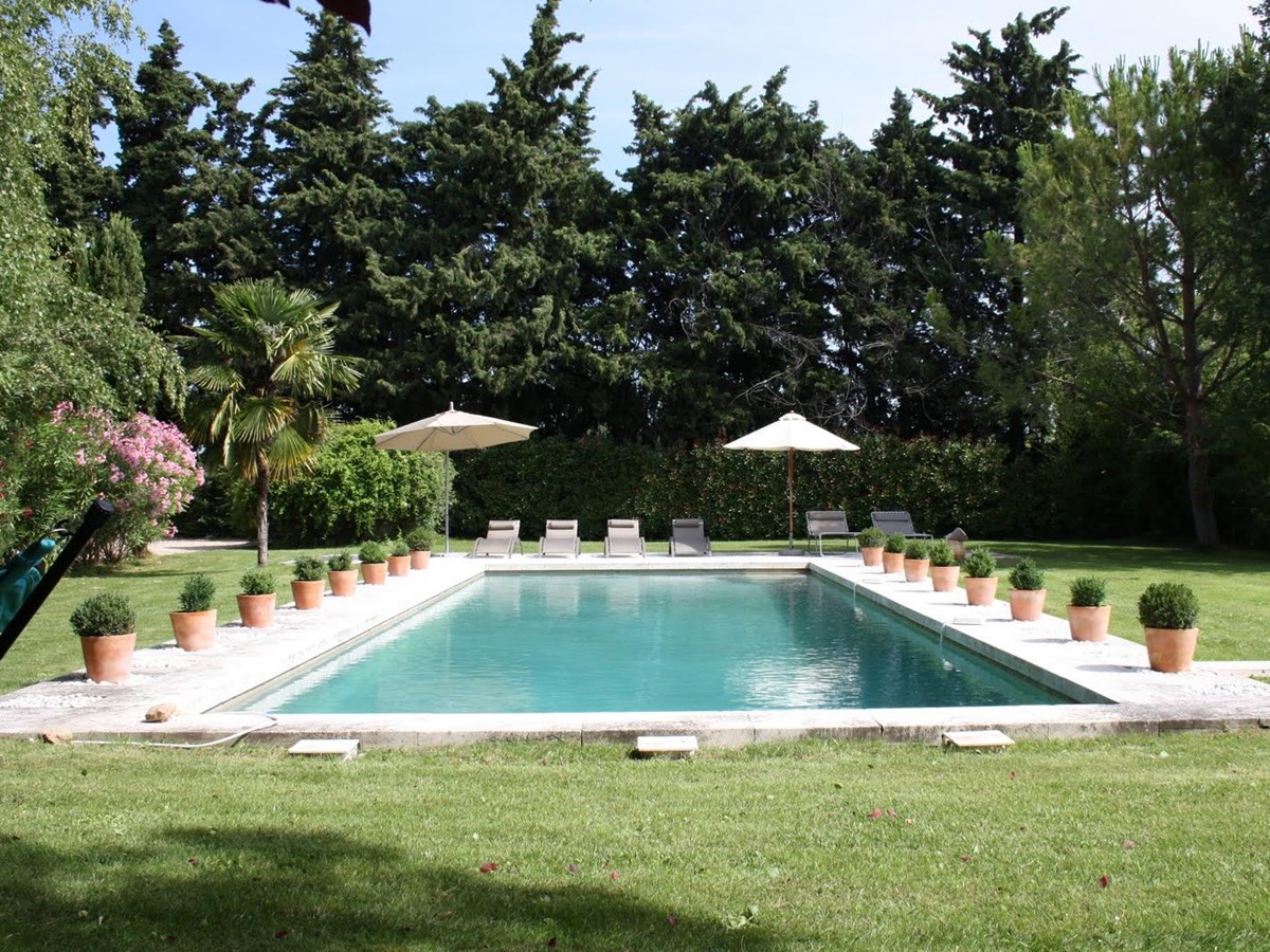 Swimming pool in garden at Mas Jaisses, Provence
