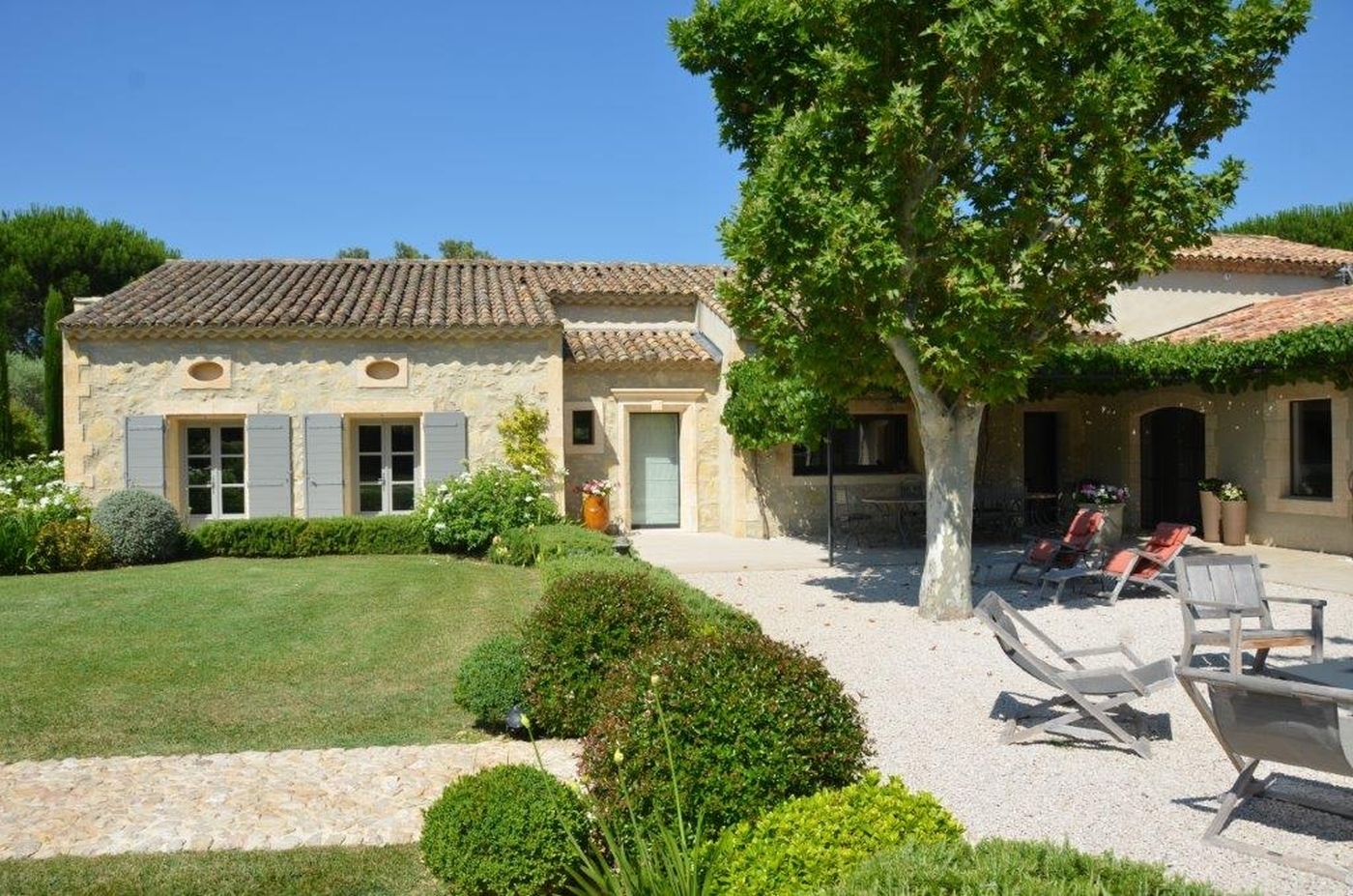 Outdoor seating with exterior of property at Mas Laurent in Provence