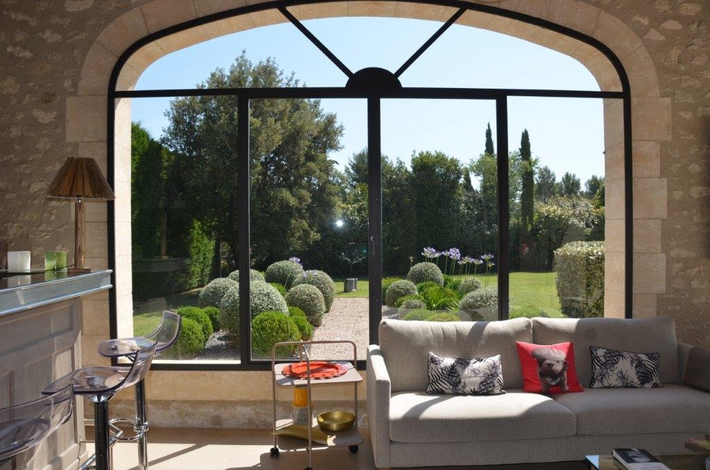 Large window looking out to the garden at Mas Laurent in Provence
