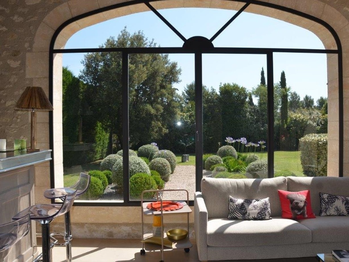 Large window looking out to the garden at Mas Laurent in Provence