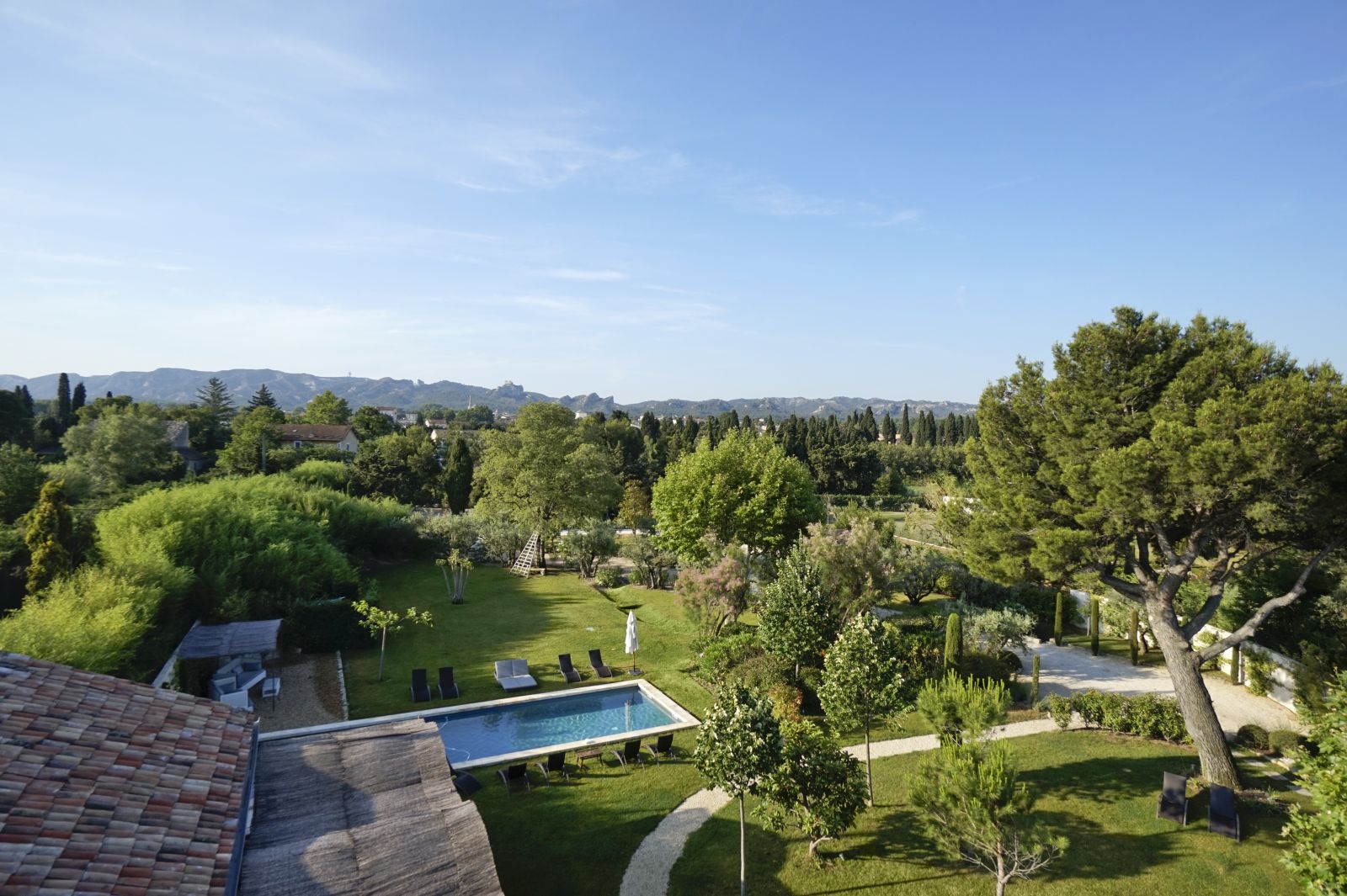 Areal view of the pool and gardens at villa Mas Peyre near St Remy de Provence