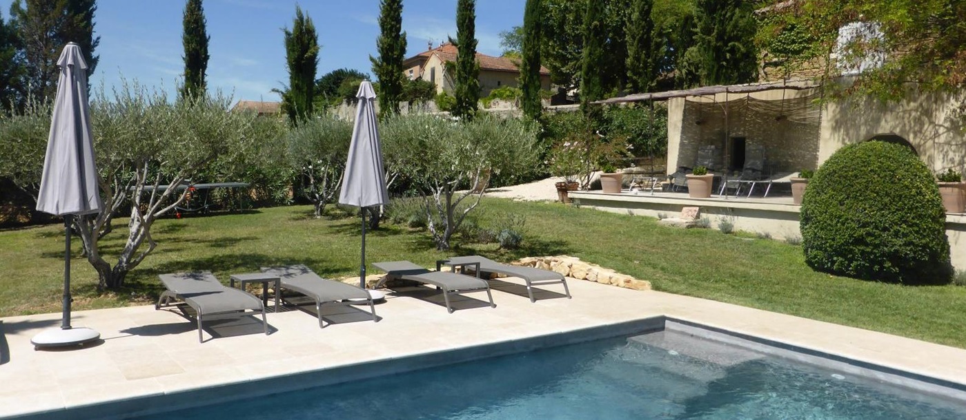 Sunbeds at the swimming pool of Villa Romaine, Provence