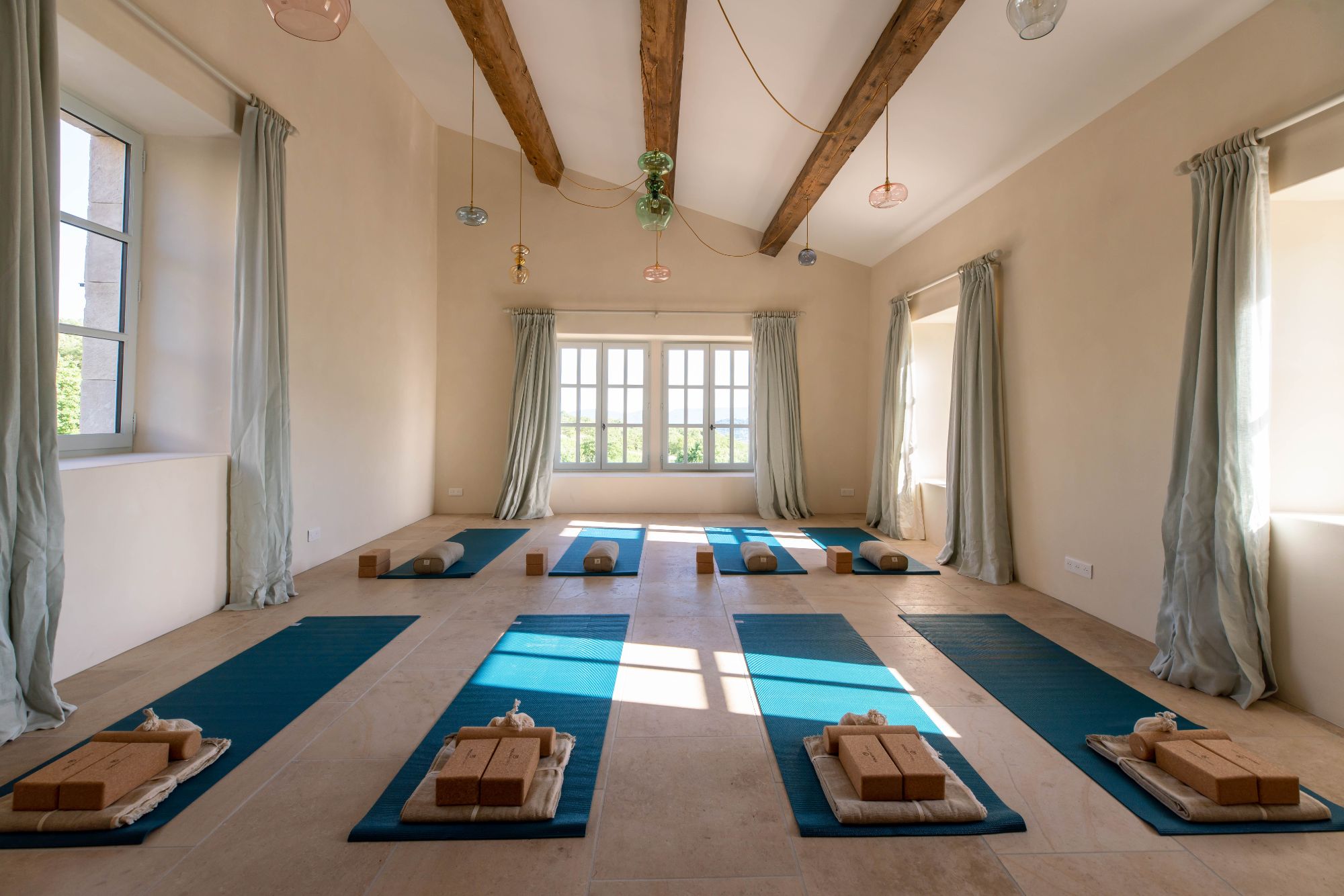 Yoga studio with mats at Villa Thyme