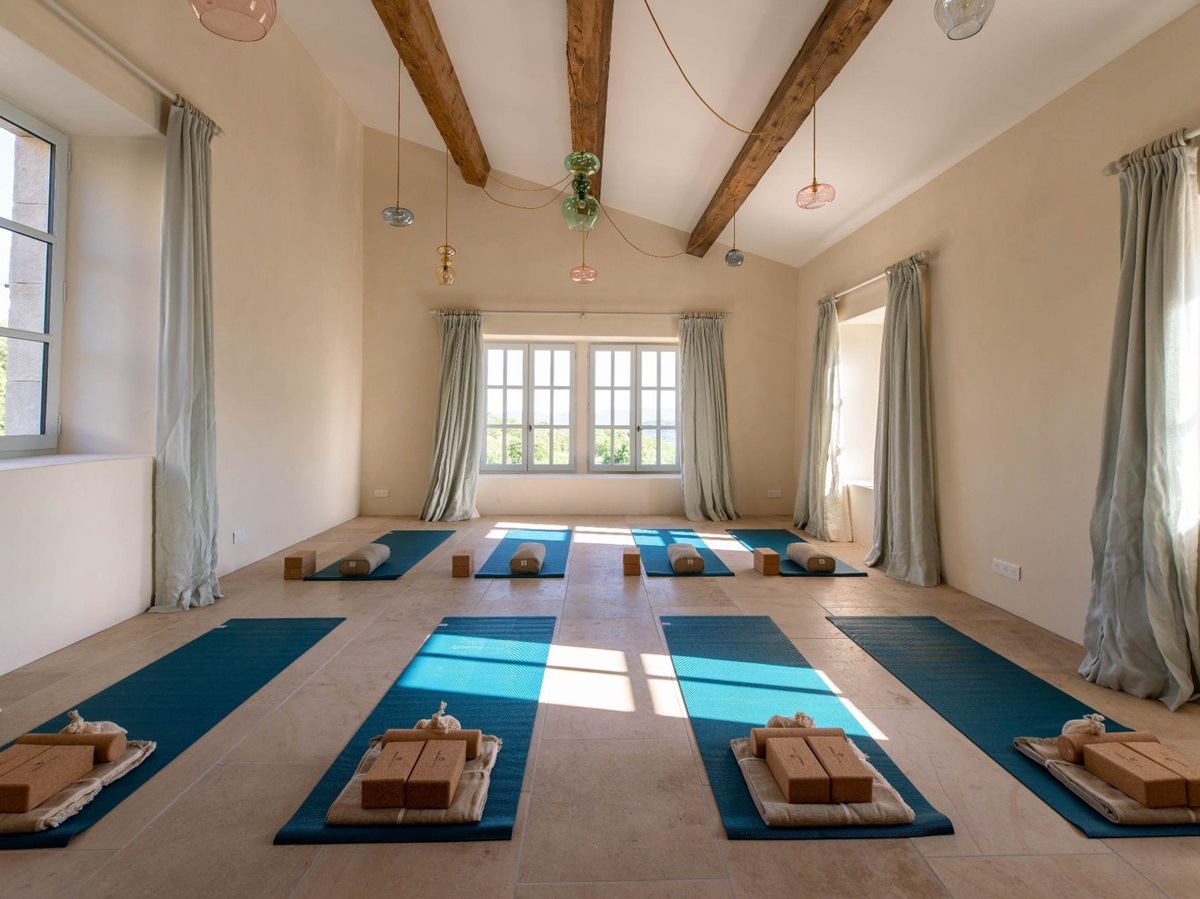 Yoga studio with mats at Villa Thyme