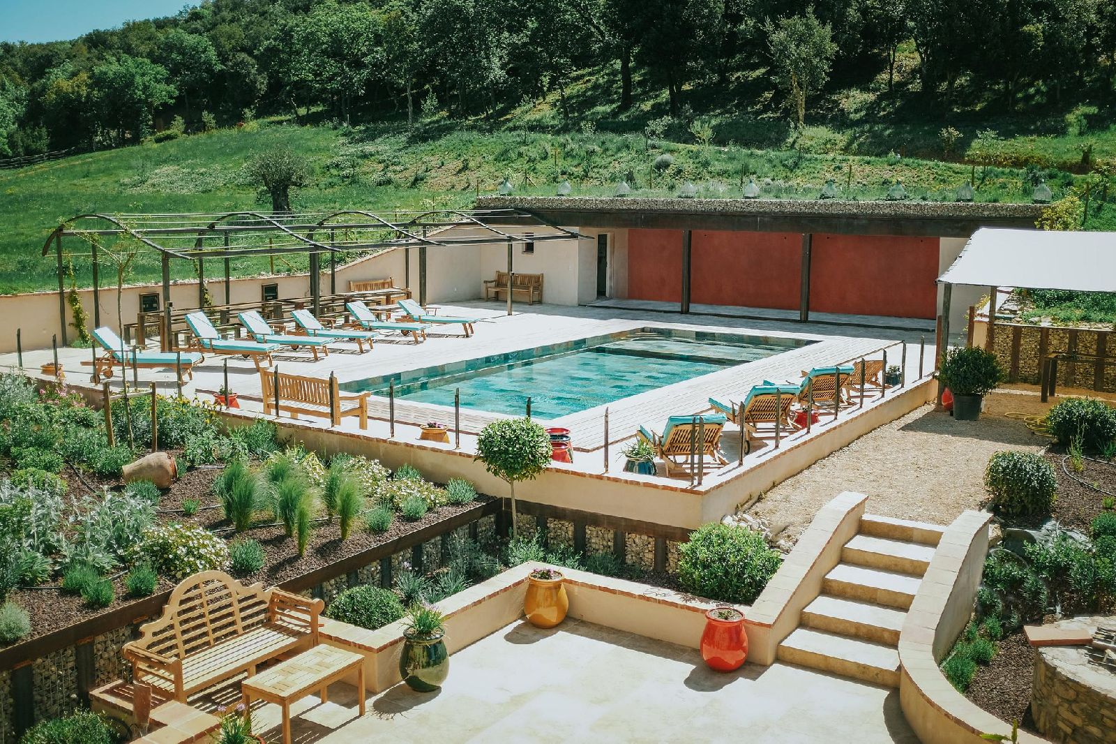 Pool with pool house and seating at Castelnou in South West France
