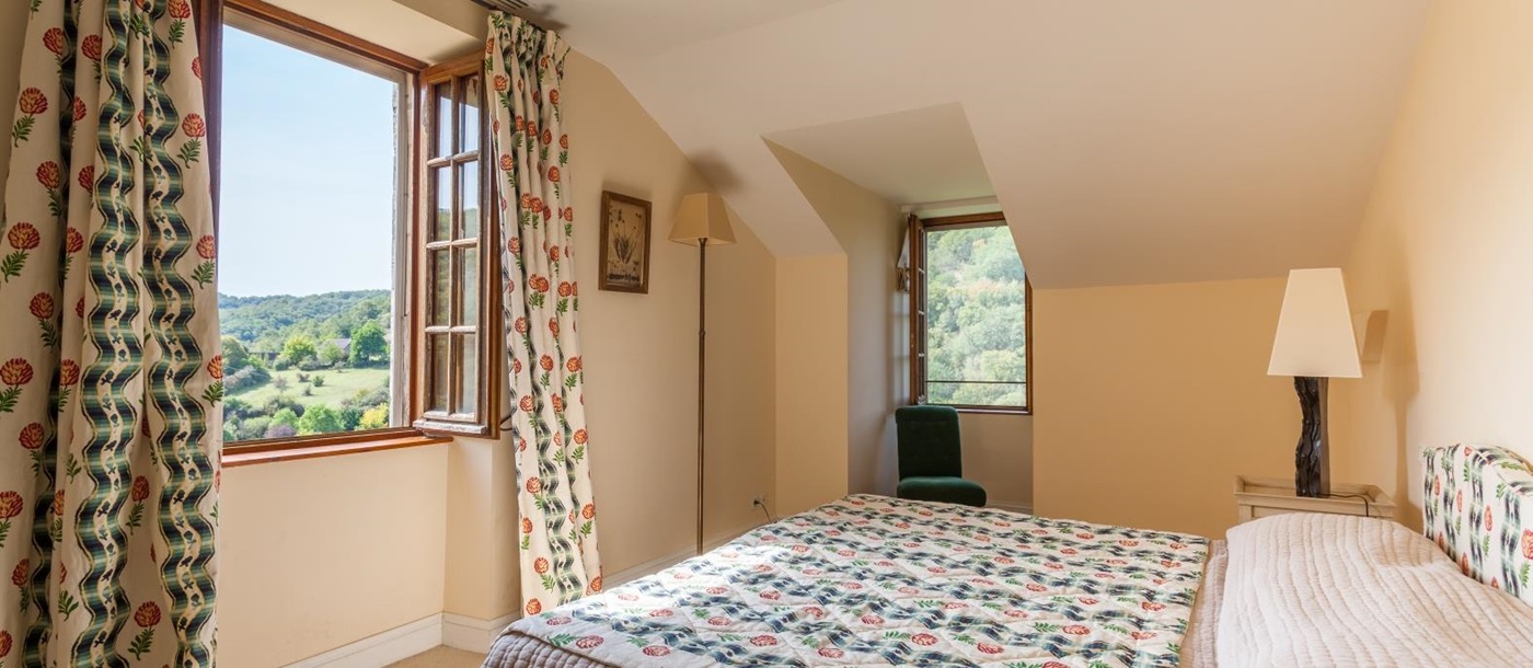 green double bedroom in Chateau Falaise, South West France