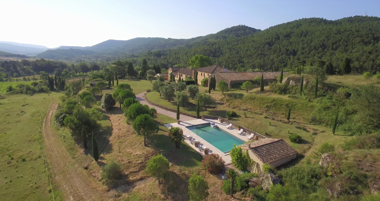 Aerial view of villa, pool and surrounding countryside at Domaine de Corbieres in South West France