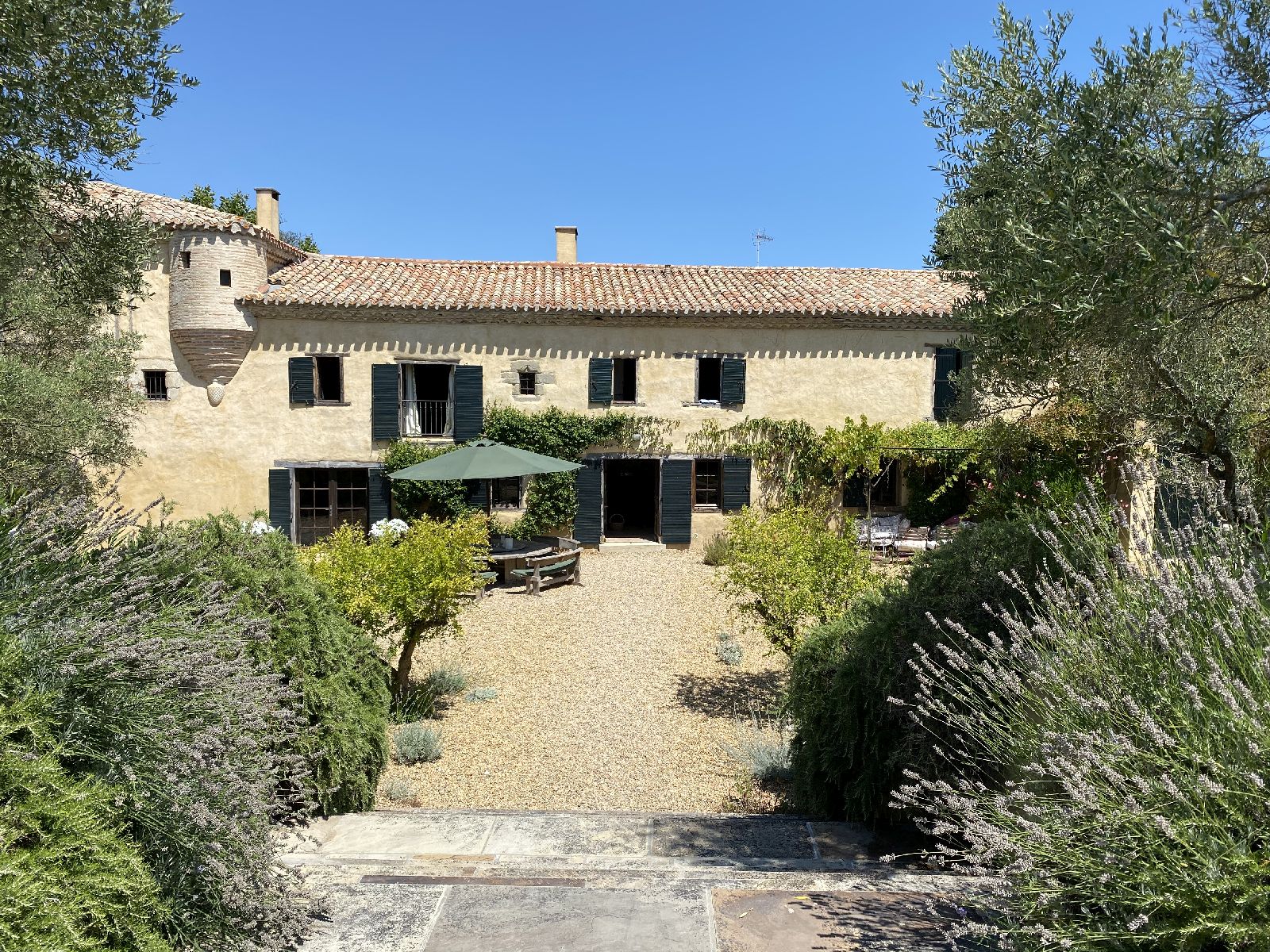 Entrance to villa and pathway at Domaine de la Hille in France