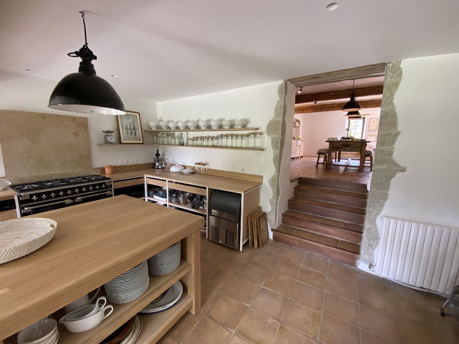 Kitchen with large island at Domaine de la Hille in France