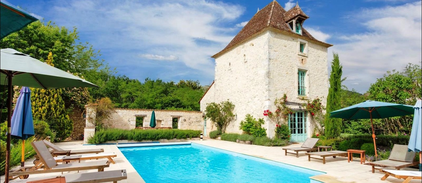 swimming pool at luxury villa Manoir des Sources in the Dordogne region of France