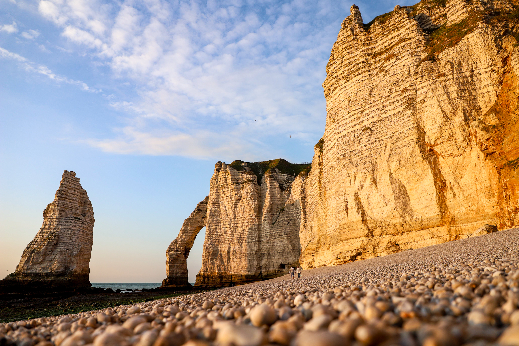 Beach with arched rock formations in Normandy