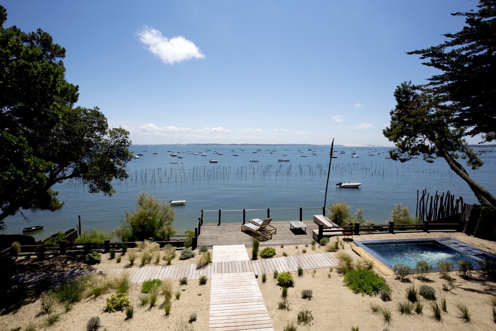 View of garden, pool, balcony and sea from Villa Carmen in South West France