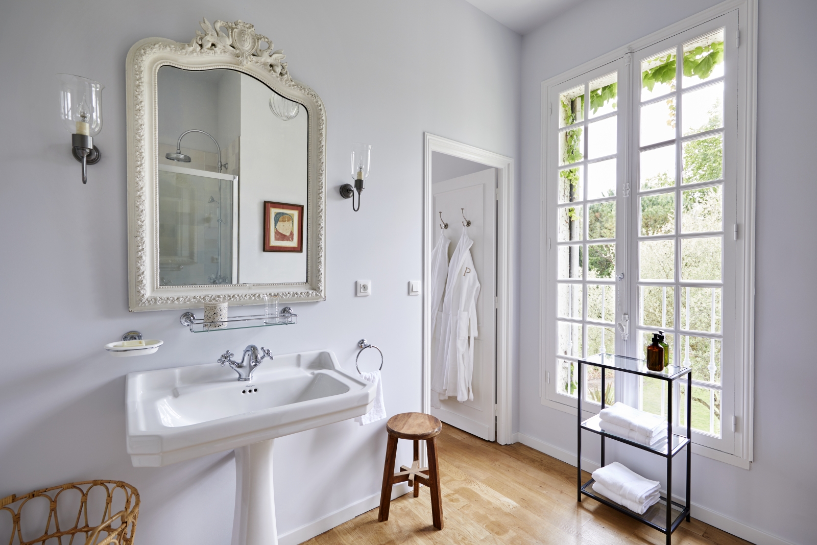 bathroom with shower and robes at pomiera, france