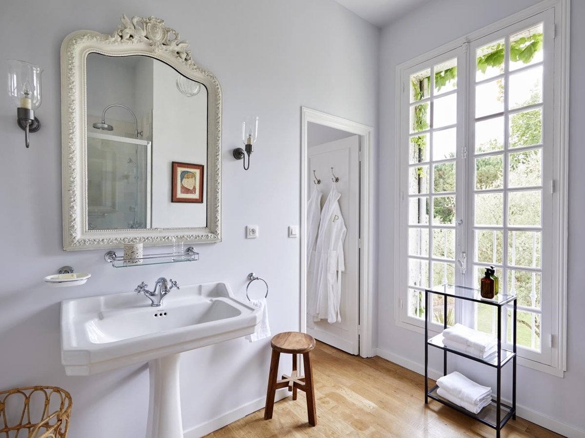 bathroom with shower and robes at pomiera, france
